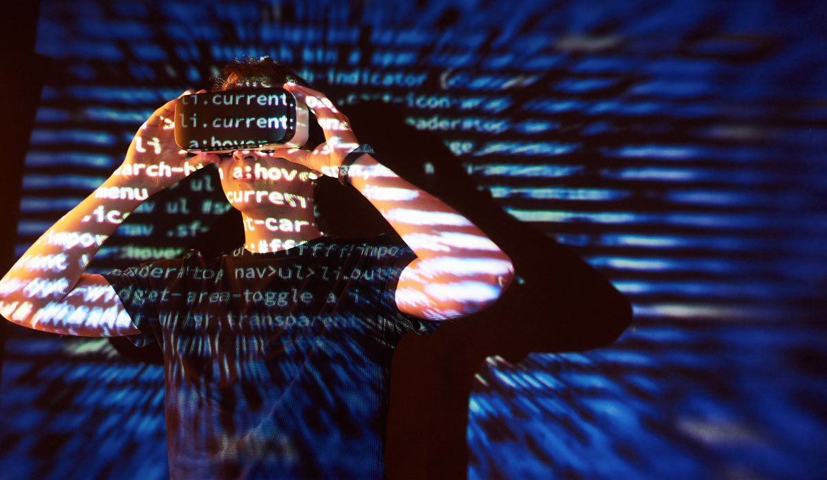 virtual-reality-vr-headset-is-presumably-gamer-hacker-cracking-code-into-secure-network-server-with-lines-code